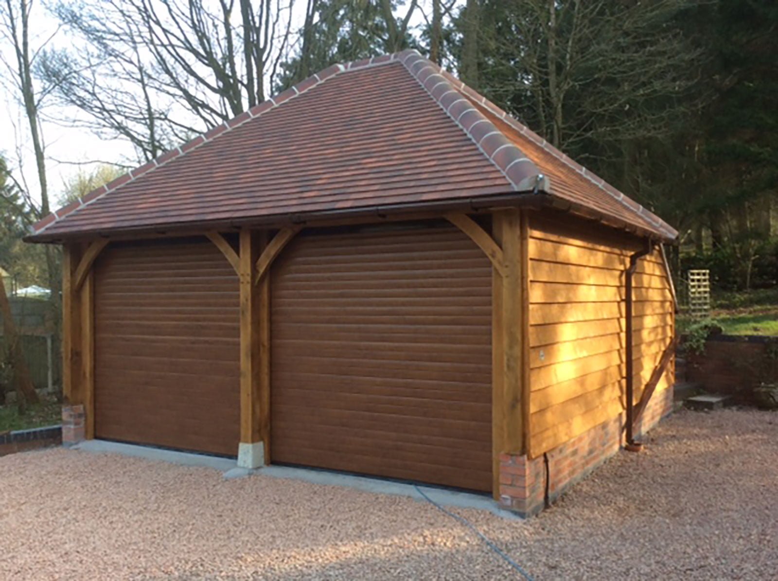 2bayoakframedgaragewithsectionalgaragedoors(2) Oak Frames Direct