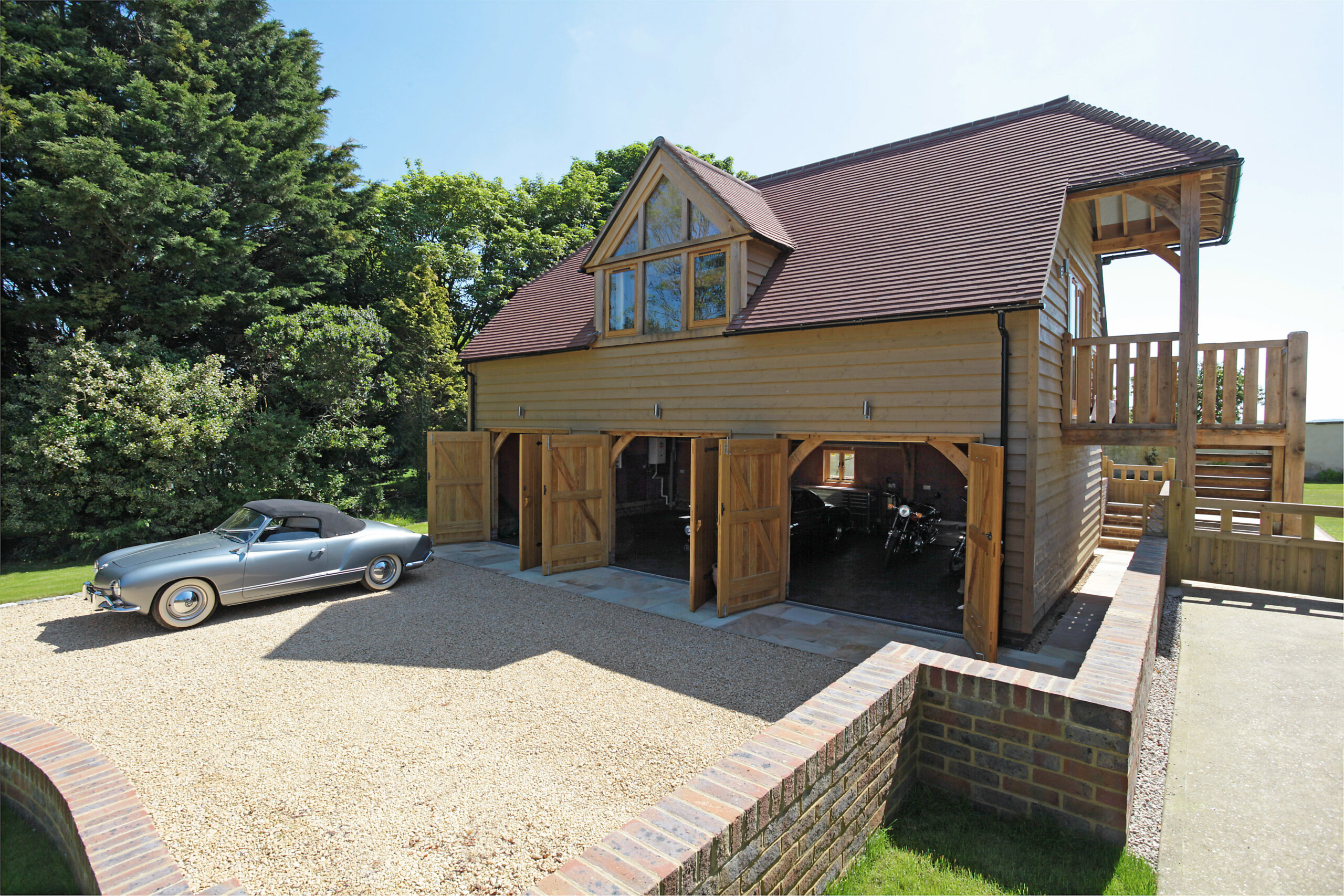 Three bay garage with room above